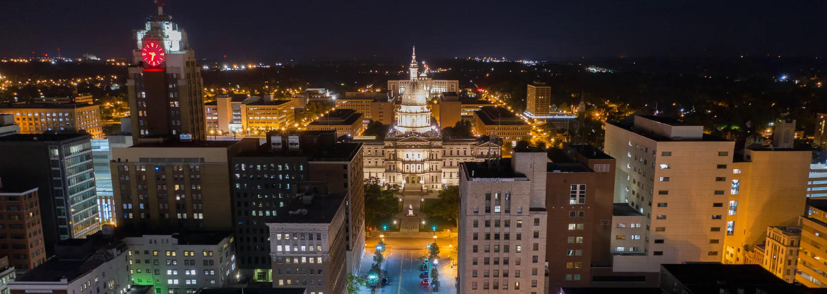 Lansing skyline at night featuring the capitol building