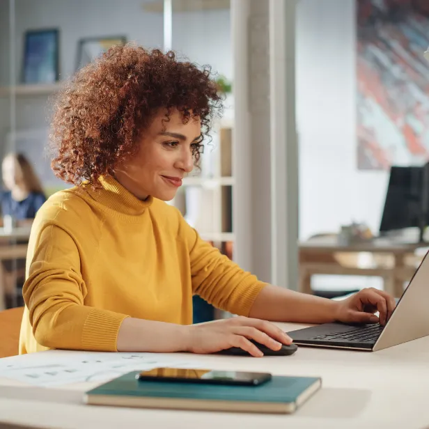 woman looking at computer screen
